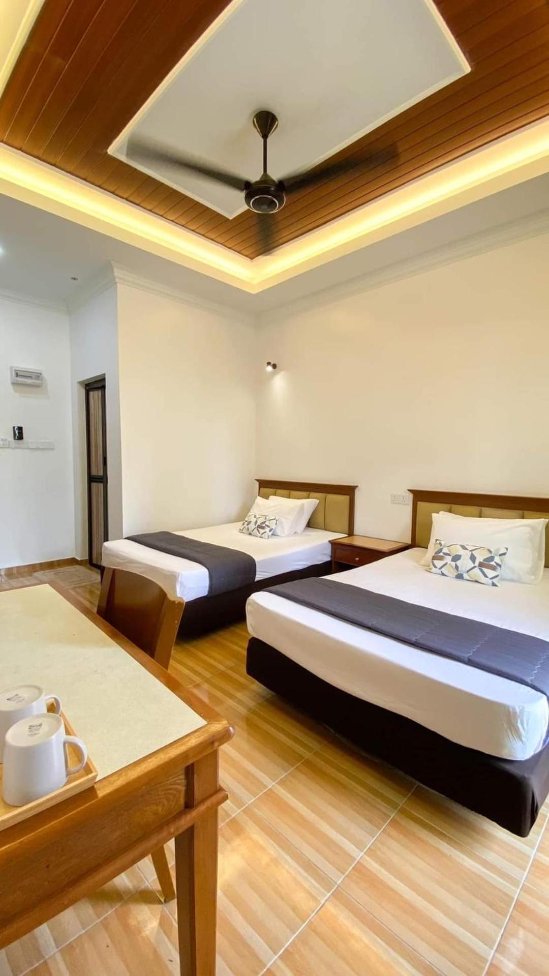 Eleven25 Roomstay Dungun Bagian luar foto