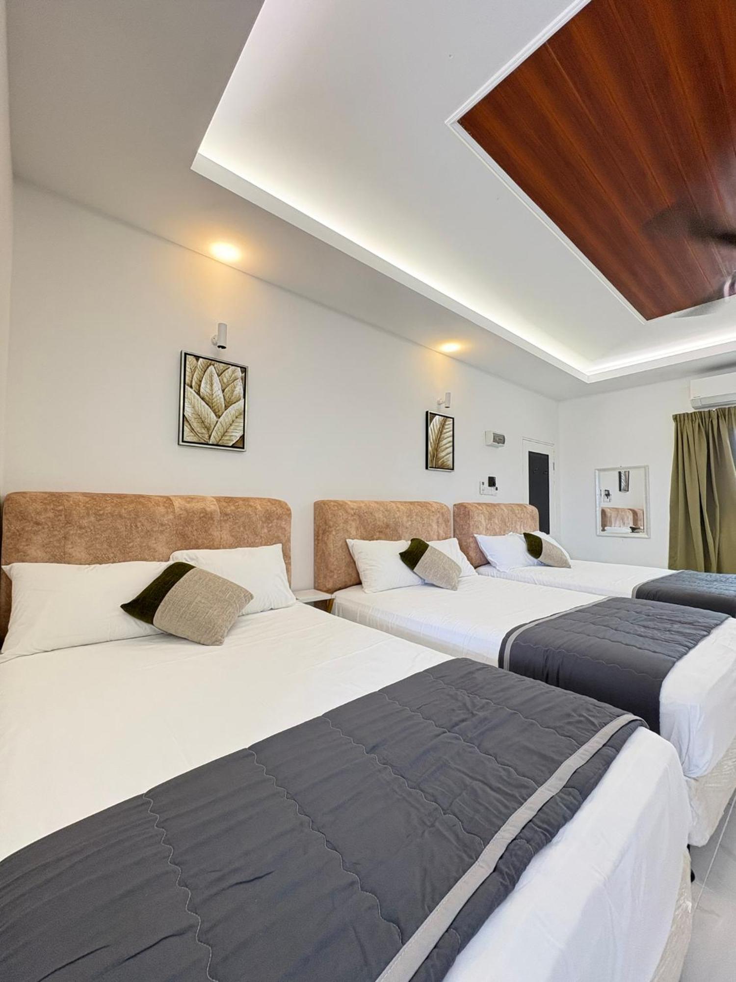 Eleven25 Roomstay Dungun Bagian luar foto